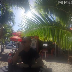 Phil relaxing under trees