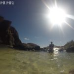 Kelsey relaxing on the rocks