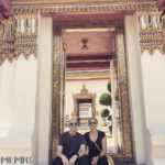 Kelsey and Phil outside a Wat in Bangkok